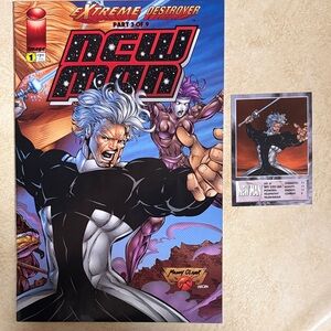 New Man Comic Book and Card